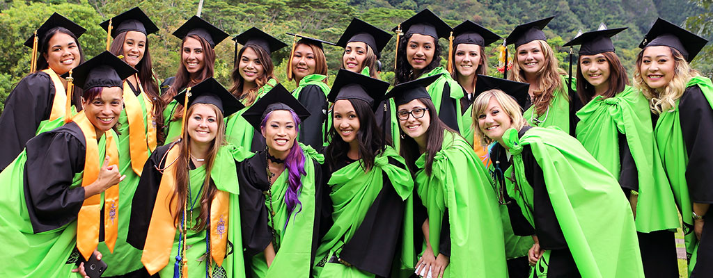 Hawaii college students in graduation caps